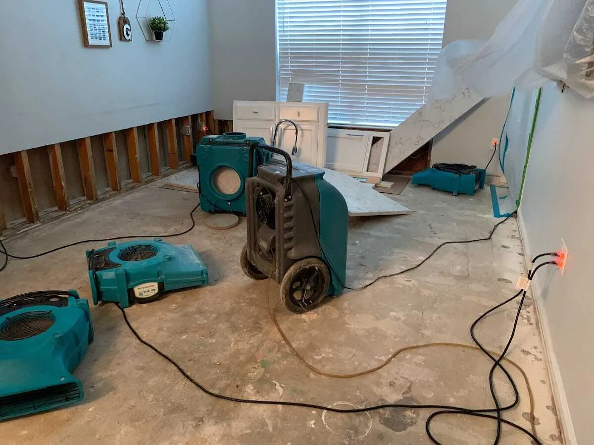 Dehumidifier in flood-cut room for Water Damage Restoration in Stratford